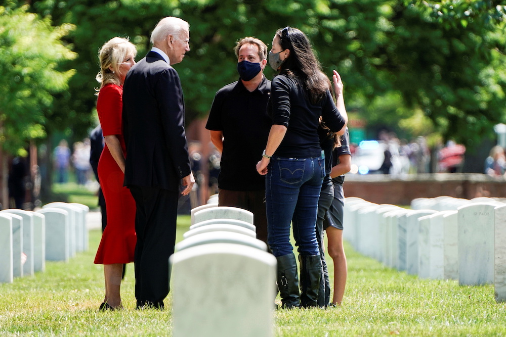 US President Joe Biden and US first lady Jill Biden greet one of the families on Memorial Day in Section 12 of Arlington National Cemetery in Virginia, US, May 31, 2021. u00e2u20acu201d Reuters picn n