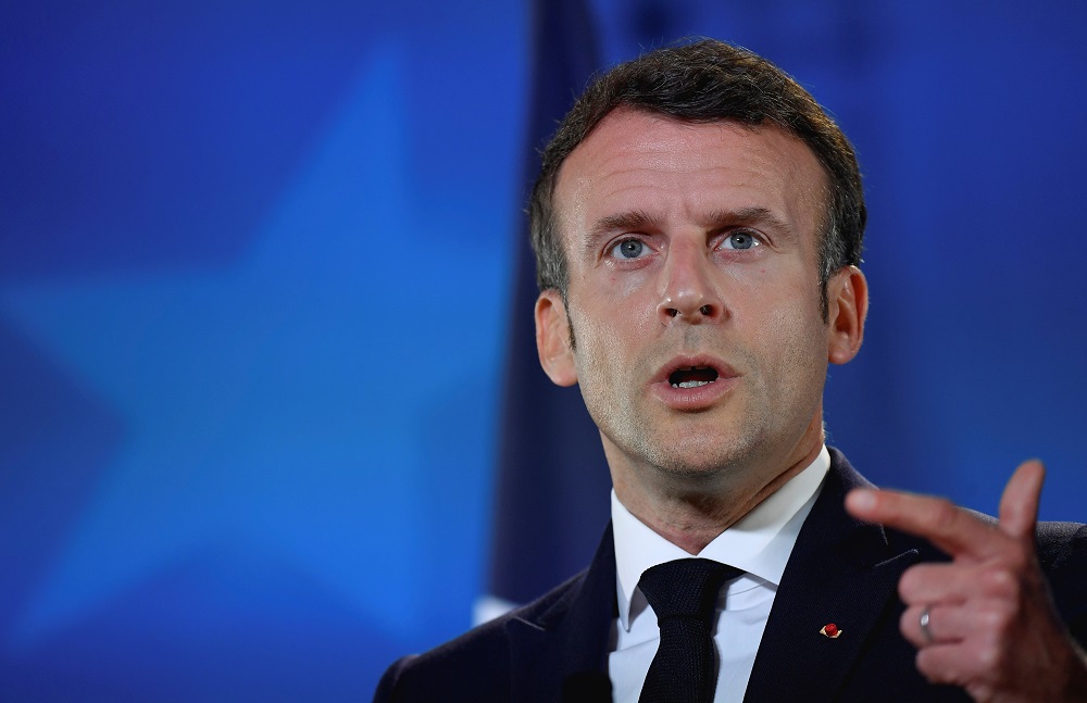 French President Emmanuel Macron gestures as he addresses media representatives at a press conference in Brussels, Belgium, May 25, 2021. u00e2u20acu2022 Pool via Reuters
