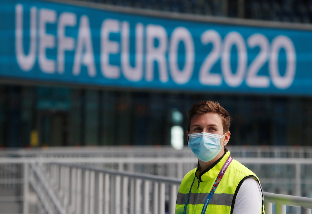 A steward wearing a face mask is pictured during a media tour at the Gazprom Arena soccer stadium, one of the host venues for the Euro 2020 tournament, in Saint Petersburg, Russia May 22, 2021. u00e2u20acu201d Reuters picnn