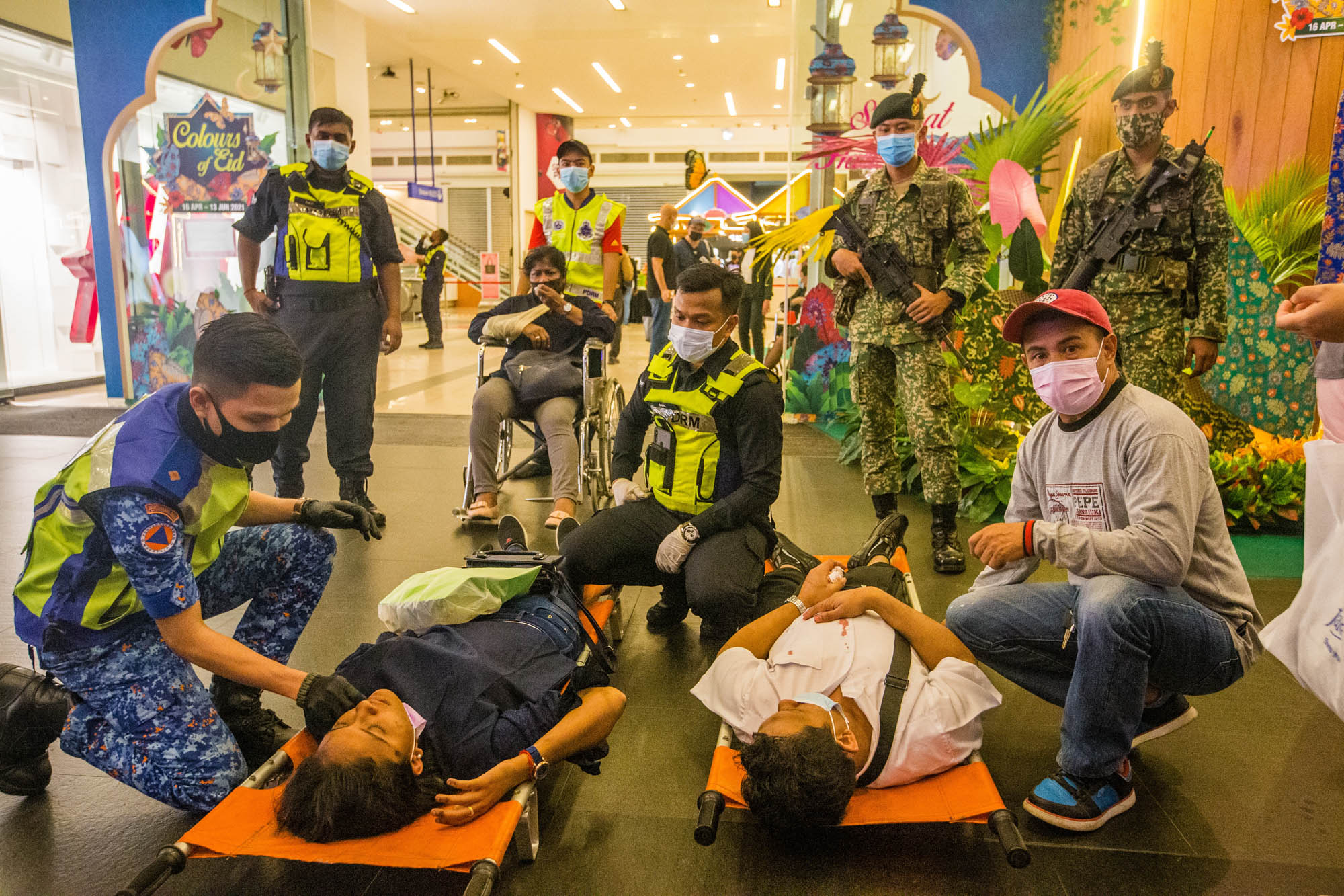 Rescue personnel tending to injured passengers at KLCC station during an incident involving trains numbered 40 and 81 at the LRT Kelana Jaya line, May 24, 2021. u00e2u20acu201d Picture by Firdaus Latifn