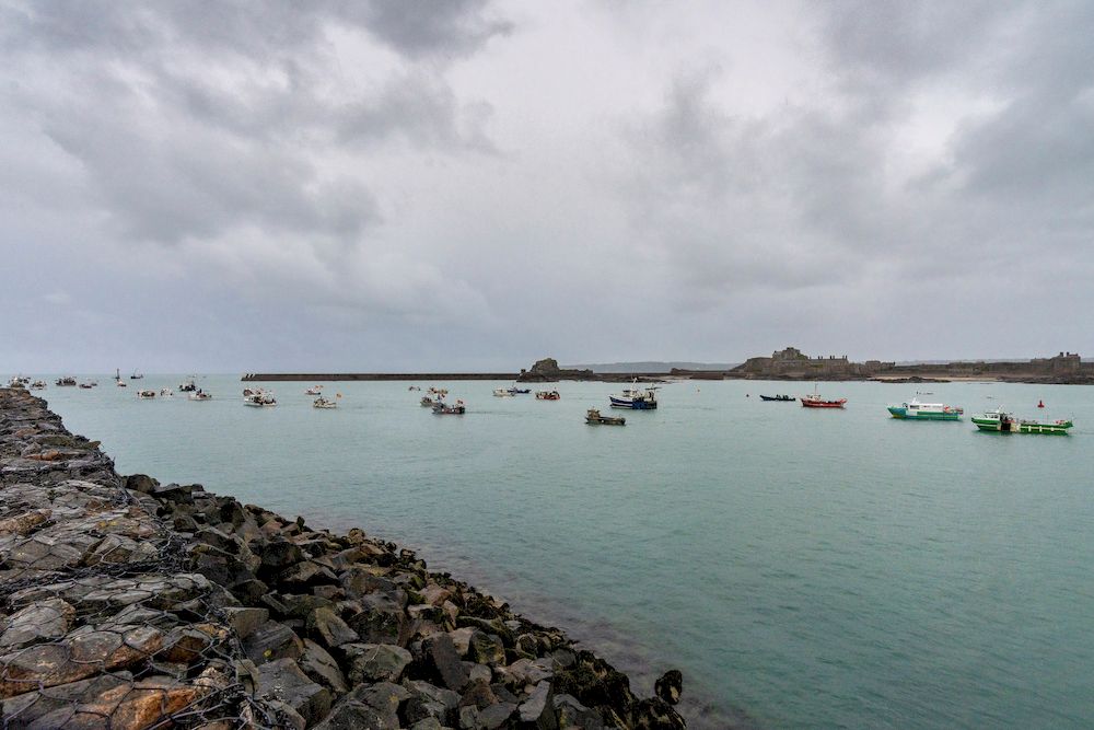 French fishing fleet is seen at the entrance to the harbour in St Helier, Jersey May 6, 2021. u00e2u20acu201d Marc Le Cornu picture via Reuters