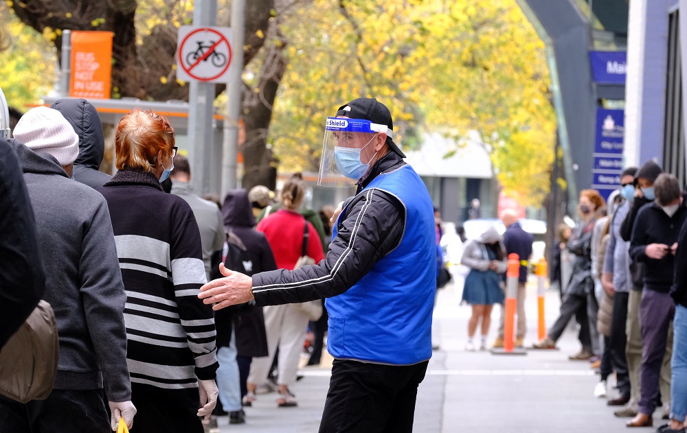People line up to get tested for Covid-19 outside the Royal Melbourne Hospital as the city experiences a new cluster of cases in Melbourne May 25, 2021. u00e2u20acu2022 AAP Image/Luis Ascui via Reuters