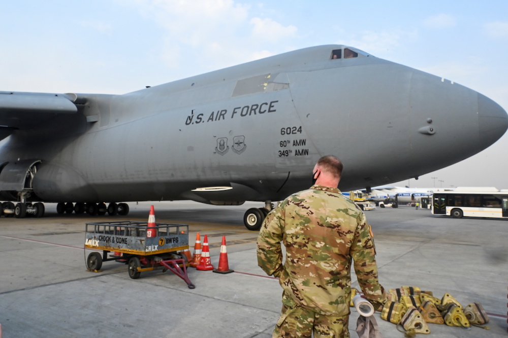 A US Air Force aircraft is seen on the tarmac after landing with coronavirus disease relief supplies from the United States at the Indira Gandhi International Airport cargo terminal inNew Delhi, India April 30, 2021. — Reuters pic