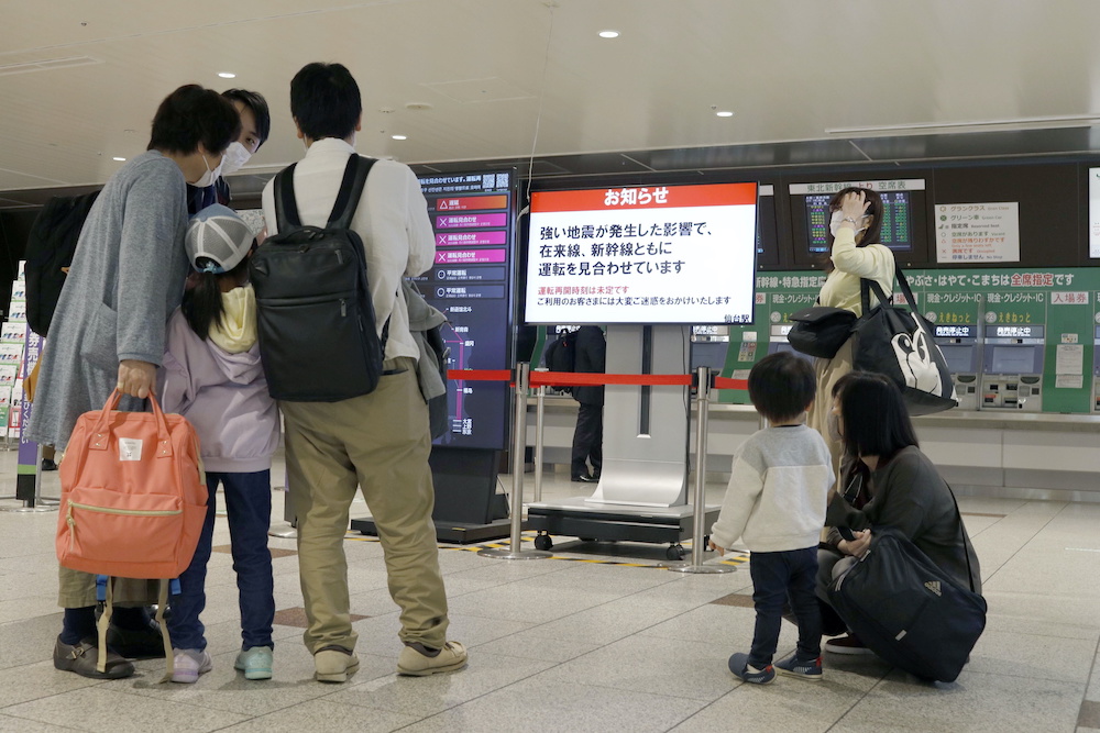 People gather around a ticket gate as train services are suspended following an earthquake in Sendai, Miyagi prefecture, Japan in this photo taken by Kyodo on May 1, 2021. u00e2u20acu201d Reuters pic