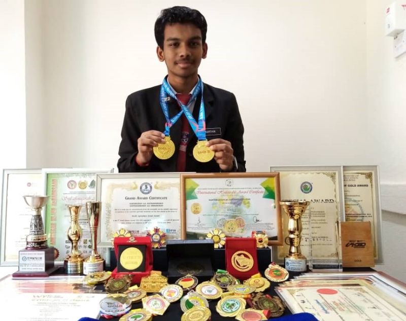 Karthikgesan showing his gold medals that he won for creating eco-friendly pots in the recent virtual global competition. u00e2u20acu201d Picture courtesy of Karthikgesan Santharasekaran
