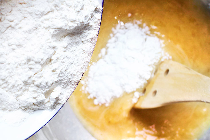 Fold in the flour and baking powder mixture.