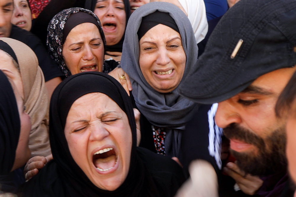 Relatives of Palestinian Malek Hamdan, who was killed amid clashes between protesters and Israeli security forces, mourn during his funeral in Salim near Nablus, in the Israeli-occupied West Bank May 15, 2021. ― Reuters pic