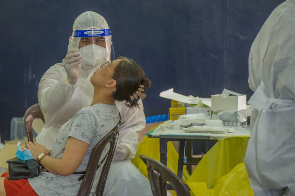 Sel Care workers carry out free Covid-19 screening in Balakong on May 9, 2021. u00e2u20acu201d Picture by Shafwan Zaidon
