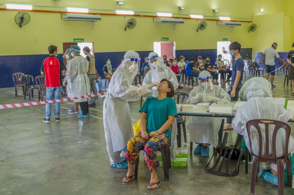 Sel Care workers carry out free Covid-19 screening in Balakong on May 9, 2021. u00e2u20acu201d Picture by Shafwan Zaidon