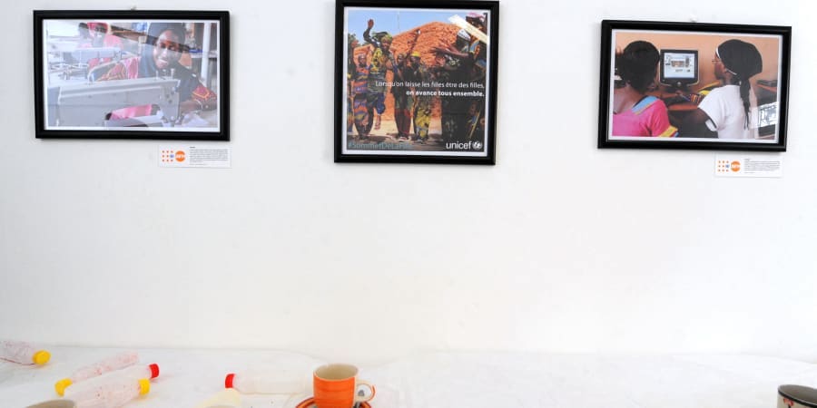 A picture shows photos at an exhibition aiming for more equality between men and women on November 25, 2014 at the Theodore Monod museum in Dakar. u00e2u20acu201d ETX Studio picnn