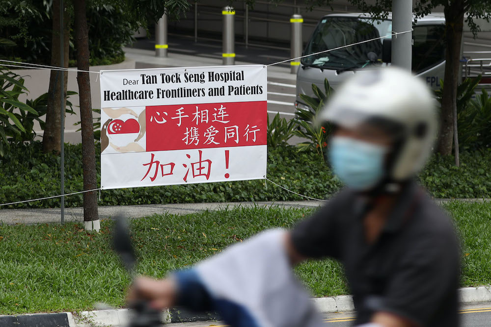 A banner outside the NCID building cheering on frontline healthcare workers and patients at TTSH, on May 12, 2021. ― Photo by Raj Nadarajan for TODAY