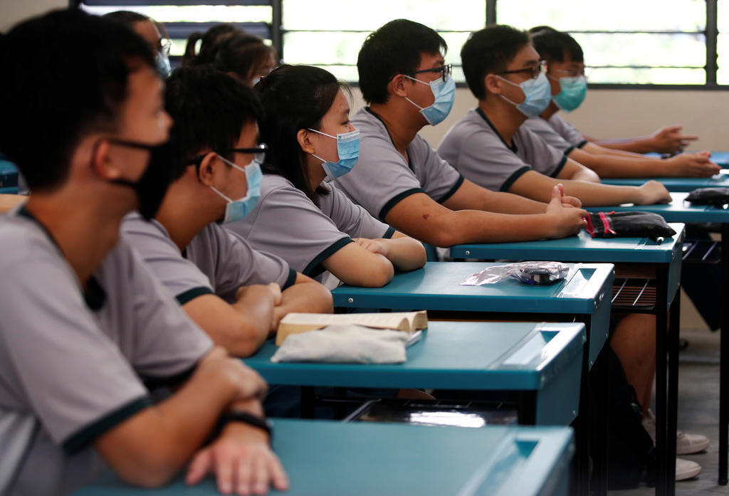 All students and staff members must wear masks, and not face shields, when in school and on campus, unless they are not able to due to special needs or medical conditions, the Ministry of Education said. u00e2u20acu2022 Reuters pic