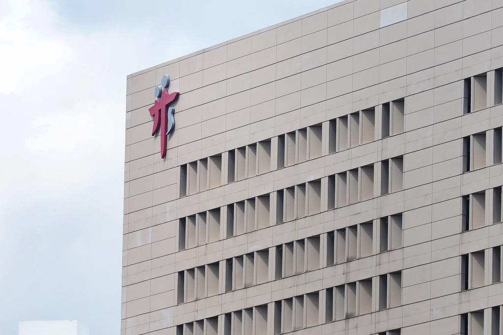 The logo of Tan Tock Seng Hospital at the top of its building. The latest person who died of complications from Covid-19 was a patient in Ward 9D there. u00e2u20acu2022 TODAY pic