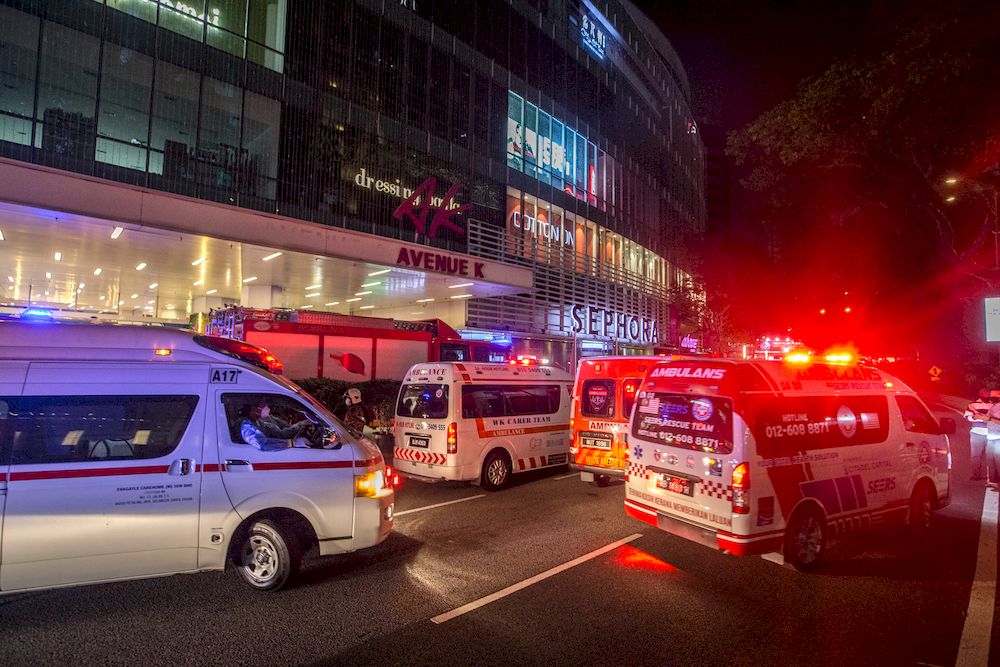 Ambulances are pictured out Avenue K at KLCC, after a collision between two LRT trains on the Kelana Jaya line, May 24, 2021. u00e2u20acu201d Picture by Firdaus Latif