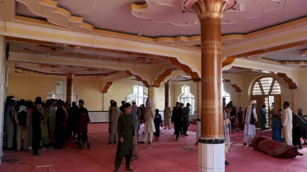 Devotees gather inside a mosque after a bomb blast on the outskirts of Kabul on May 14, 2021, that killed at least 12 people, shattering the relative calm of a holiday ceasefire between the warring Taliban and government forces. u00e2u20acu201d AFP pic