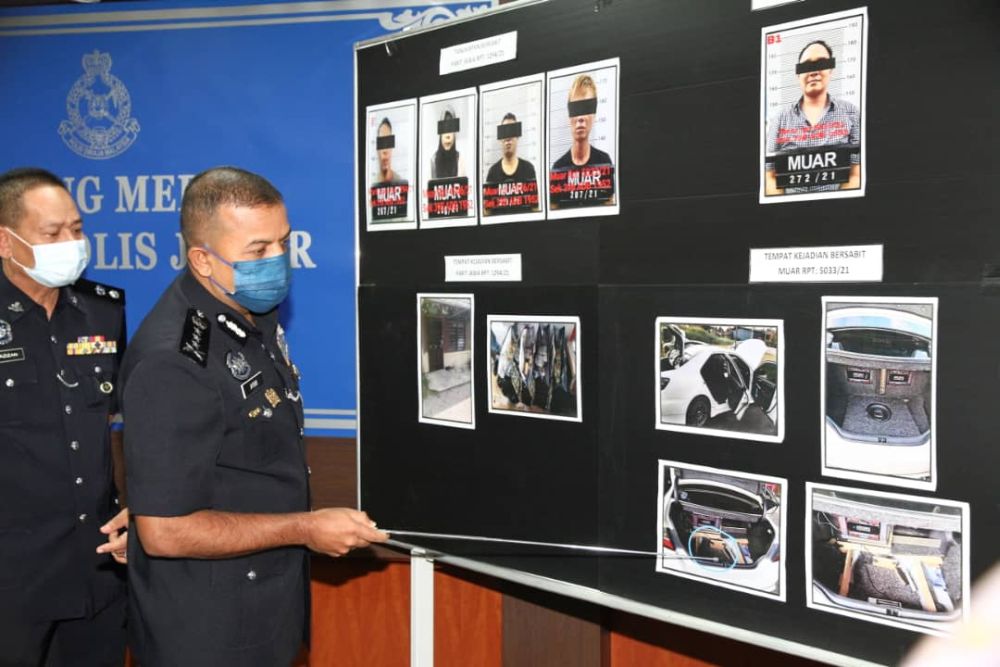 Johor police chief Datuk Ayob Khan Mydin Pitchay details the drug-smuggling modus operandi of the suspects during a media conference at the state police contingent headquarters in Johor Baru May 18, 2021. u00e2u20acu201d Picture by Ben Tan