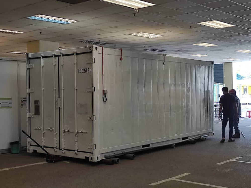 The Ministry of Health shared that the Sungai Buloh Hospital is now forced to prepare a morgue container on-site to house bodies of dead Covid-19 patients May 16, 2021. u00e2u20acu201d Picture via Twitter/KKMalaysia