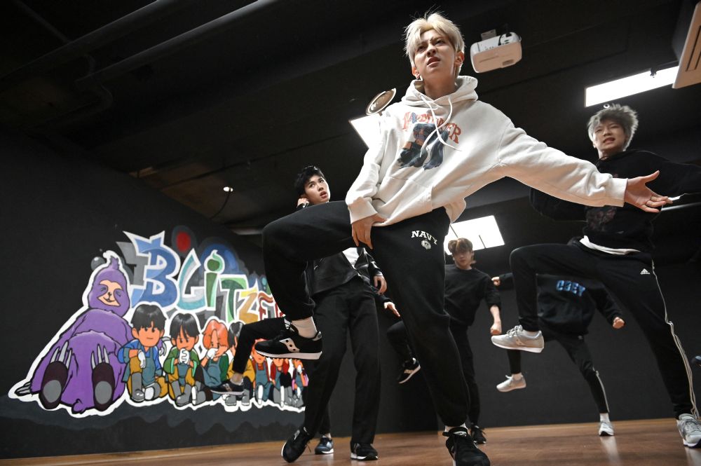 Members of the K-pop boy band Blitzers performing during their dance practise session at a rehearsal studio in Seoul April 29, 2021. u00e2u20acu201d AFP pic