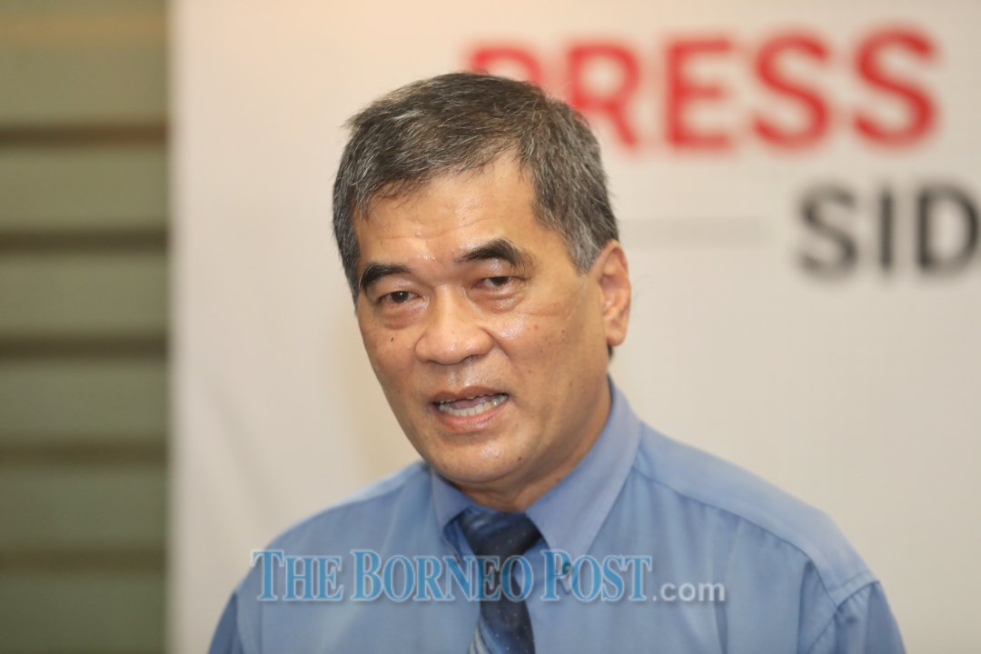 Sarawak Health Director Dr Chin Zin Hing speaking at an SDMC press conference on Covid-19 update in Kuching. u00e2u20acu2022 Picture by Chimon Upon via Borneo Post 