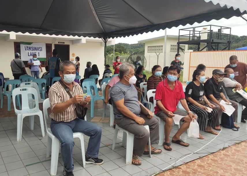 People waiting for their turn to receive the vaccines. u00e2u20acu2022 Picture courtesy of JaPEN Song via Borneo Post