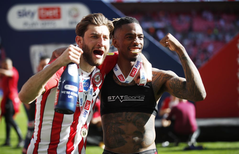 nBrentford's Charles Goode and Ivan Toney (right) celebrate after winning the Championship play-off final against Swansea at Wembley, London May 29, 2021. u00e2u20acu201d Reuters picn