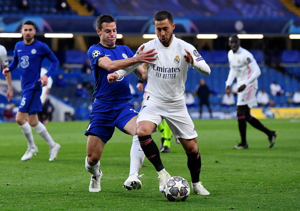Chelseau00e2u20acu2122s Cesar Azpilicueta in action with Real Madridu00e2u20acu2122s Eden Hazard at the Champions League semi final second leg match at Stamford Bridge in London, May 5, 2021. u00e2u20acu201d Reuters pic 