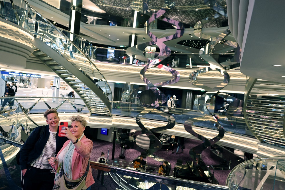 Passengers stand in the atrium as they board the MSC Virtuosa cruise ship as it prepares to set sail following the easing of Covid-19 restrictions in Southampton, southwest England on May 20, 2021. u00e2u20acu2022 AFP pic
