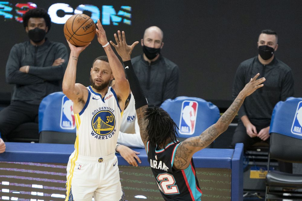 Golden State Warriors guard Stephen Curry (30) shoots the basketball against Memphis Grizzlies guard Ja Morant (12) during the third quarter at Chase Centre May 16, 2021. u00e2u20acu201d Reuters picnn