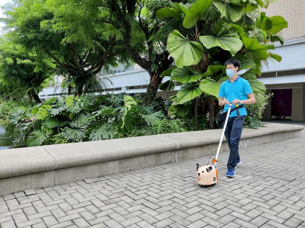 Nanyang Polytechnic student Dallon Au demonstrating the e-Guide Dog. u00e2u20acu201d Nanyang Polytechnic pic via TODAY