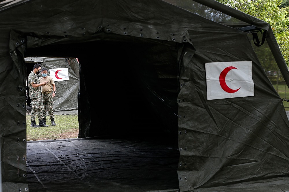 Malaysian Armed Forces personnel setting up the field intensive care unit at the Kepala Batas Hospital in Seberang Perai May 19, 2021. u00e2u20acu2022 Picture by Sayuti Zainudin