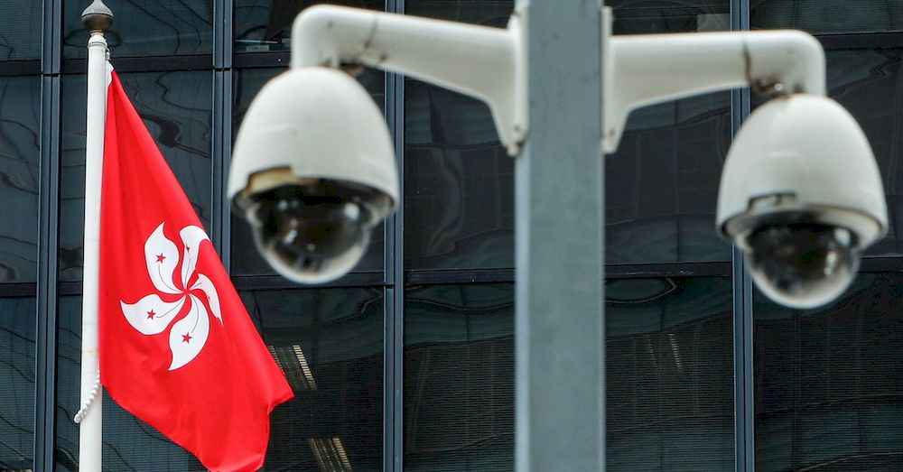 A Hong Kong flag is flown behind a pair of surveillance cameras outside the Central Government Offices in Hong Kong, China July 20, 2020. u00e2u20acu201d Reuters pic
