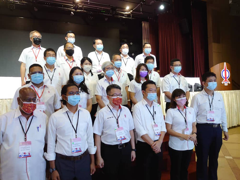 Newly appointed Johor DAP chief Liew Chin Tong (third from left, front row) posing with the partyu00e2u20acu2122s new state chapter committee members. u00e2u20acu201d Picture by Ben Tan 