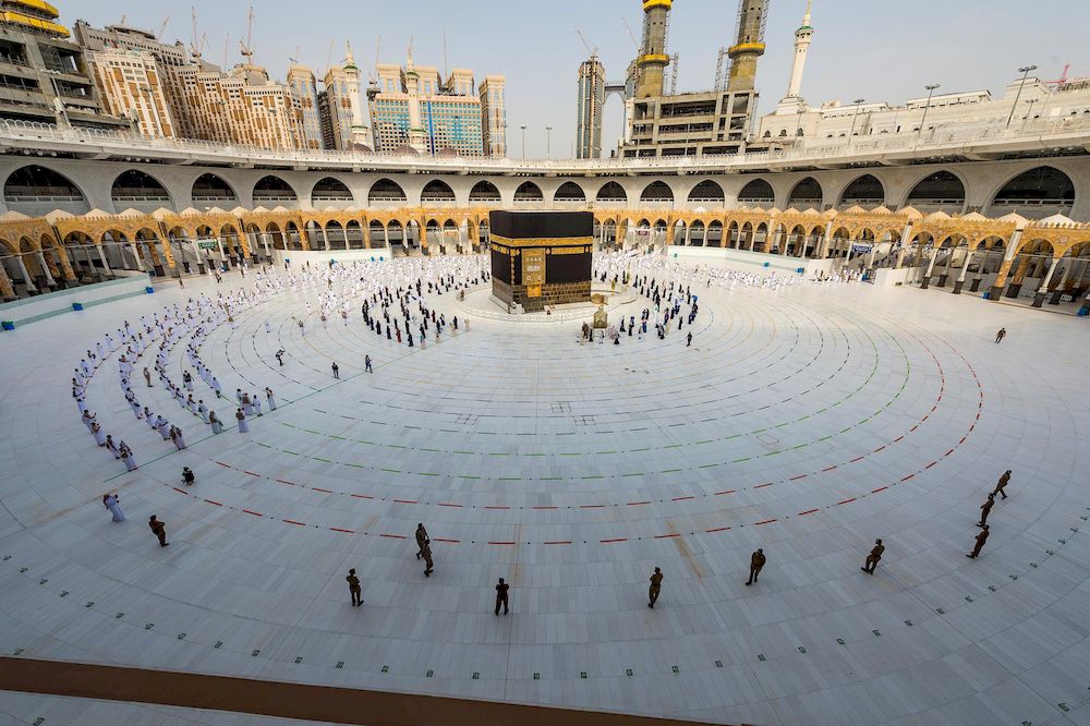 General view of Kaaba as Muslim pilgrims wearing face masks and keeping social distance pray facing Kaaba during the annual Haj pilgrimage amid the Covid-19 pandemic, in Mecca, Saudi Arabia July 31, 2020. u00e2u20acu201d Saudi Press Agency/Handout via Reuters