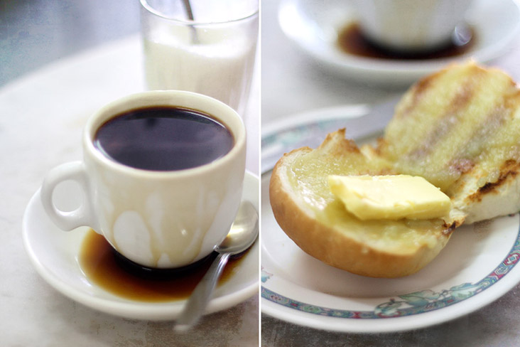 The dynamic duo of every 'kopitiam' menu: 'kopi O' and 'roti bakar' with 'kaya' and butter.