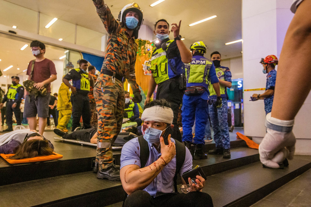 An injured passenger at KLCC station, May 24, 2021. — Picture by Firdaus Latif  