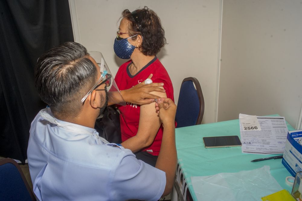 A health worker administers a dose of the Covid-19 vaccine at the Malaysia International Trade and Exhibition Centre in Kuala Lumpur May 31, 2021. u00e2u20acu201d Picture by Shafwan Zaidon