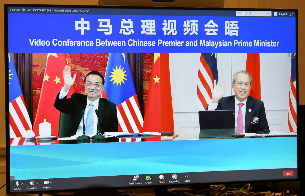 Prime Minister Tan Sri Muhyiddin Yassin during a video call with the Peopleu00e2u20acu2122s Republic of China Prime Minister Li Keqiang, May 21, 2021. u00e2u20acu201d Bernama pic 