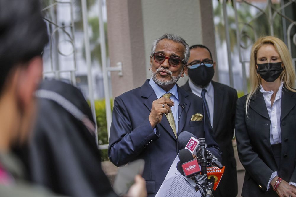 Lawyer Tan Sri Muhammad Shafee Abdullah addresses reporters during a press conference at the Kuala Lumpur High Court May 20, 2021. u00e2u20acu2022 Picture by Hari Anggara