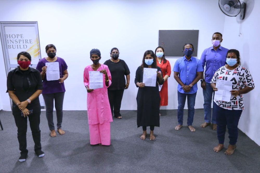 The kin of ethnic Indian men detained and tortured at the Jelebu Prison are pictured during a press conference in Kuala Lumpur May 1, 2020. u00e2u20acu201d Picture by Ahmad Zamzahuri