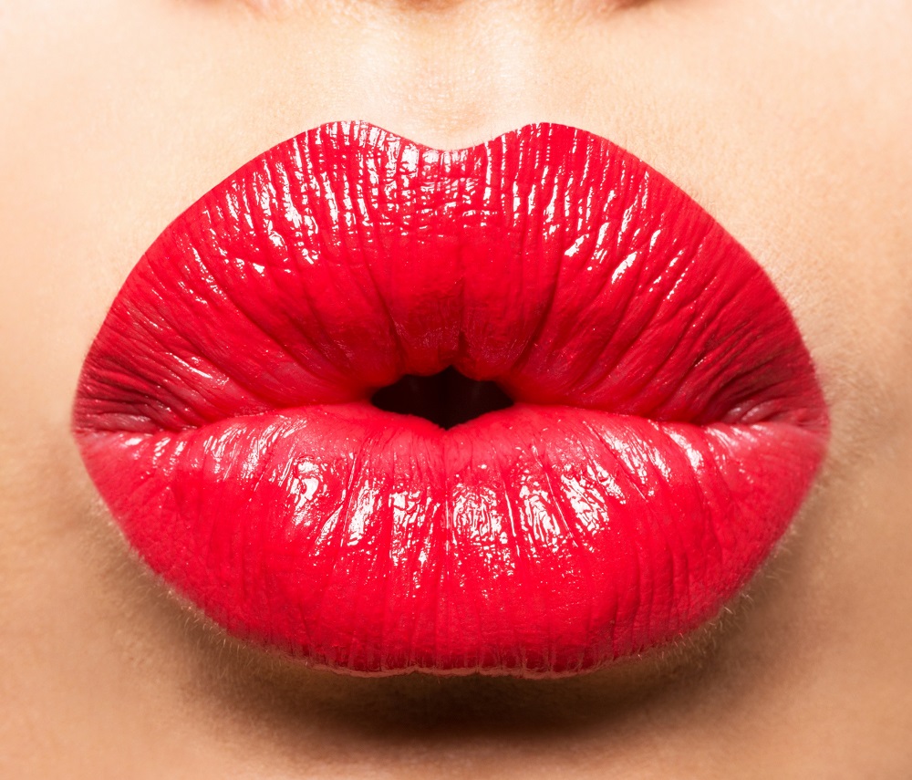 Red lipstick topped the list of most iconic beauty trends in a survey of British adults. u00e2u20acu2022 Shutterstock pic via ETX Studio