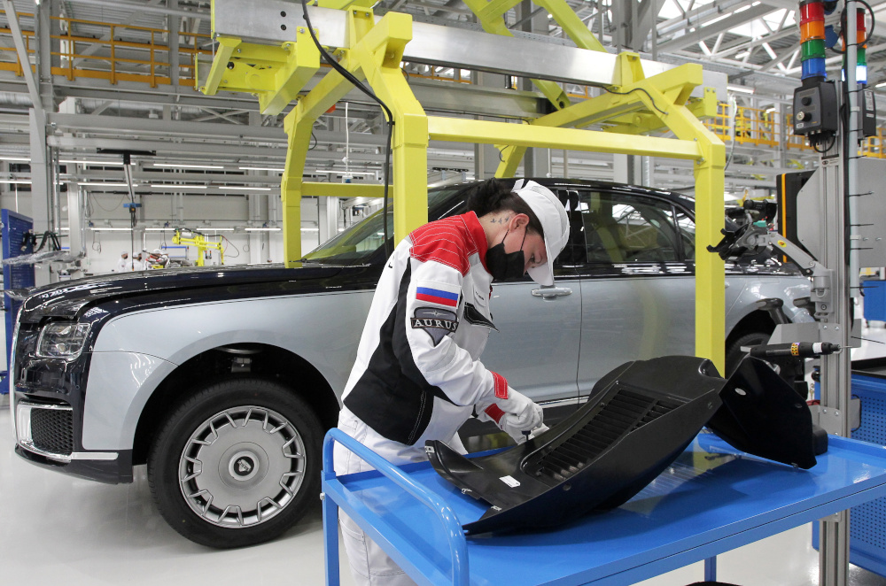 An employee works on an assembly line of the Aurus manufacturing plant in the town of Yelabuga in the Republic of Tatarstan May 31, 2021. u00e2u20acu201d Reuters pic