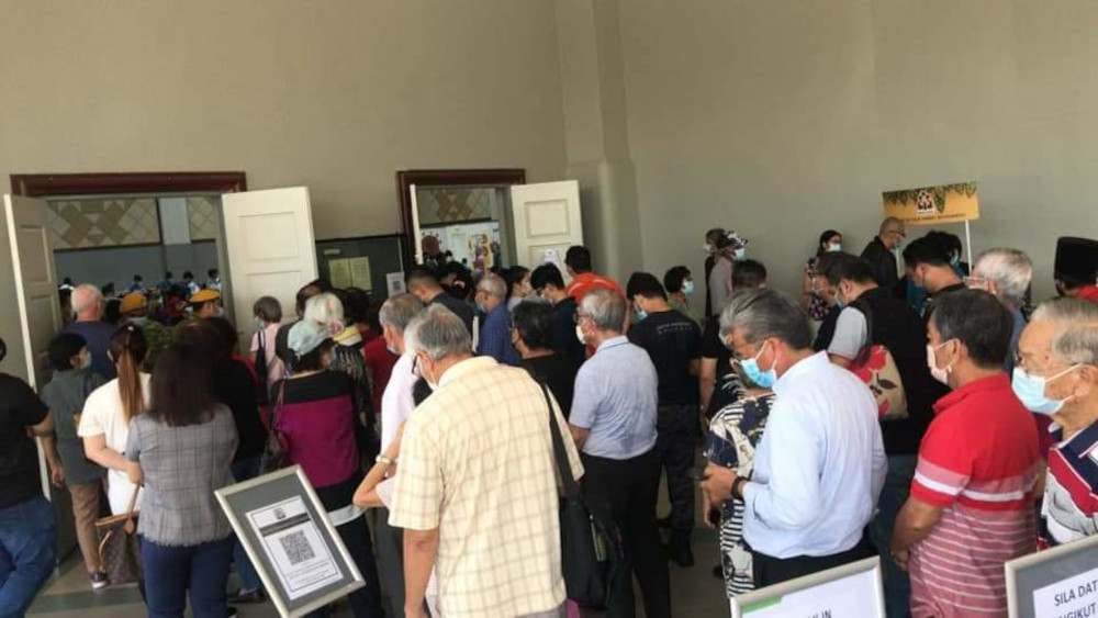 Senior citizens reportedly queued for almost two hours in a crowded space to receive the second dose of the vaccine. u00e2u20acu201d Borneo Post Online pic