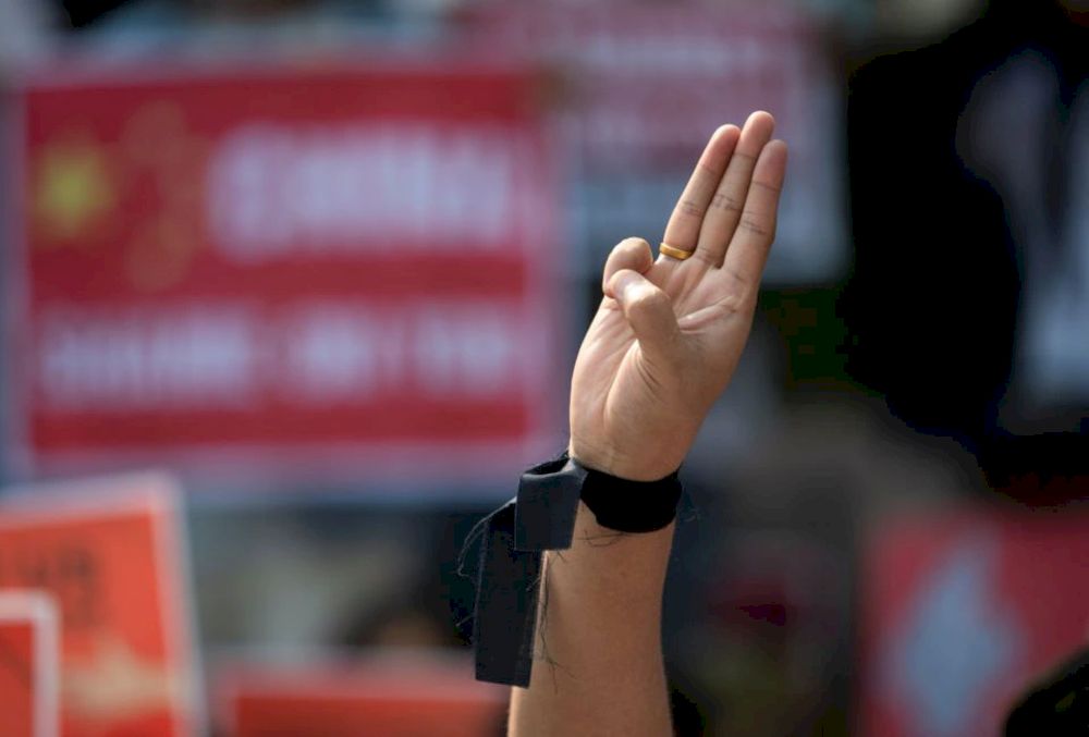 A demonstrator shows the three-finger salute during a protest against the military coup in Yangon, Myanmar, February 21, 2021. u00e2u20acu201d Reuters pic