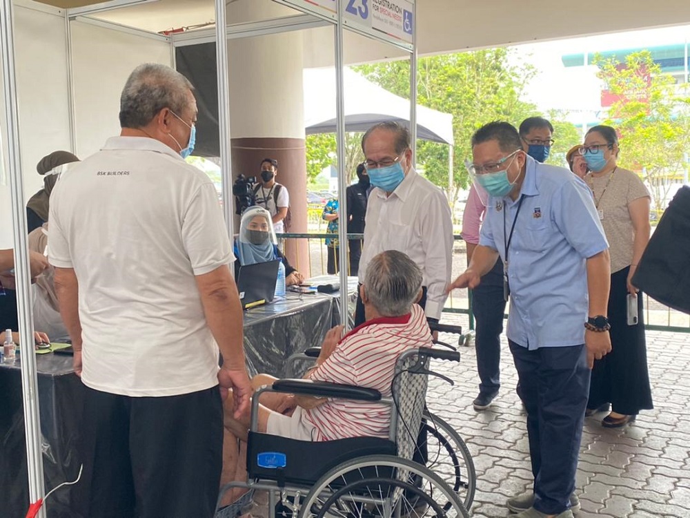 Deputy Chief Minister Datuk Amar Douglas Uggah visits the Sarawak Indoor Stadium, where the Covid-19 vaccination centre is located, in Kuching May 20, 2021. u00e2u20acu201d Picture courtesy of the Sarawak Public Communication Unit (Ukas)