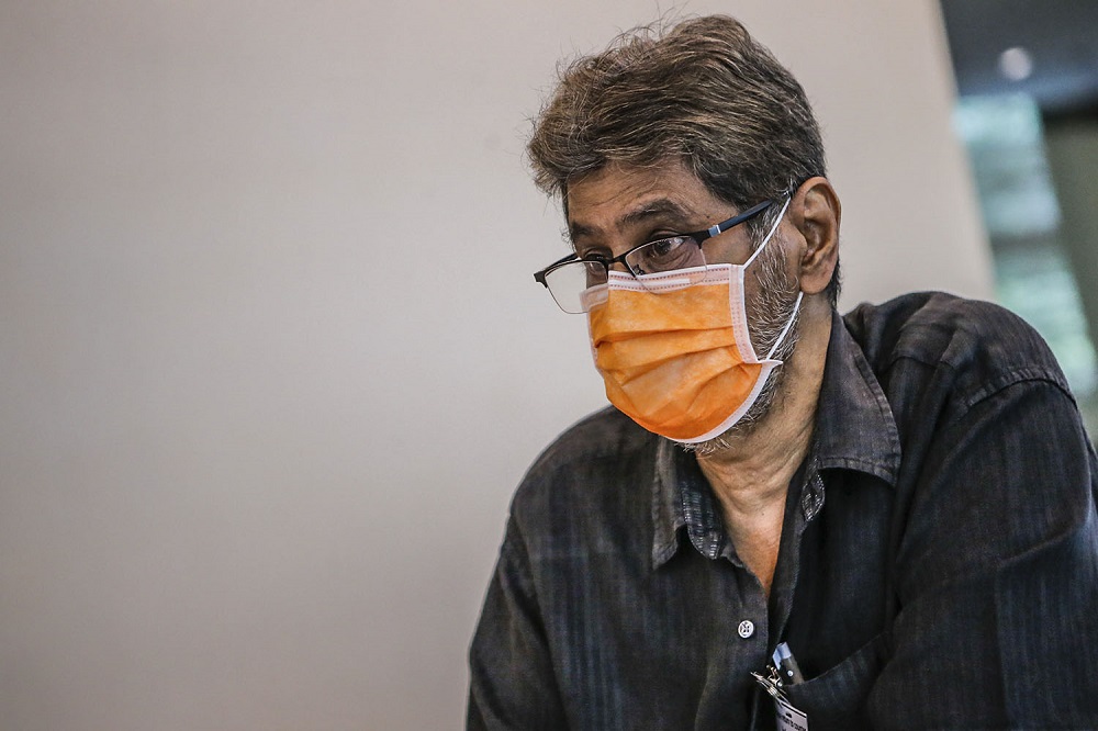 FMT managing editor Dorairaj Nadason speak to reporters after paying his last respects to Datuk Wong Sai Wan during his wake service at the Xiao En centre in Kuala Lumpur May 15, 2021. ― Picture by Hari Anggara