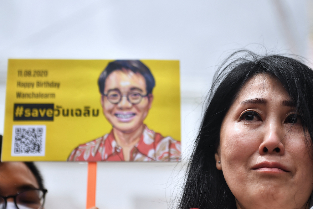 In this file photo taken on August 11, 2020, Sitanan Satsaksit, sister of missing activist Wanchalearm Satsaksit, addresses the media after marking her brother's 38th birthday in front of the Cambodian Embassy in Bangkok. u00e2u20acu201d AFP pic                