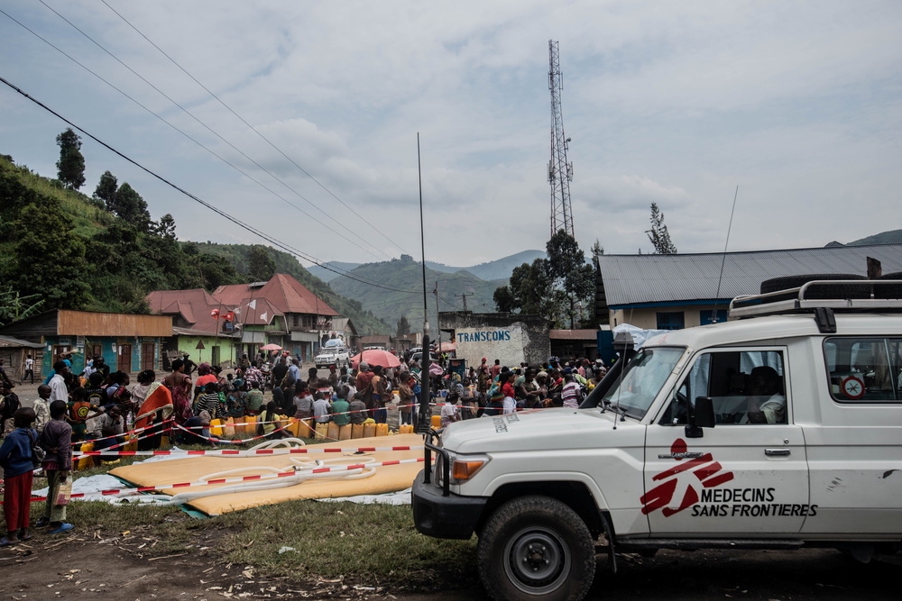 Doctors Without Borders (MSF) team members distribute water to displaced Congolese in Sake, Democratic Republic of Congo May 28, 2021. u00e2u20acu201d Medecins Sans Fronti