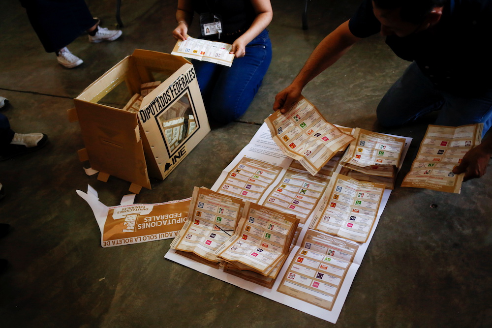 Electoral workers count ballots after polls closed on mid-term election day at a polling station in Ciudad Juarez, Mexico June 6, 2021. u00e2u20acu201d Reuters pic