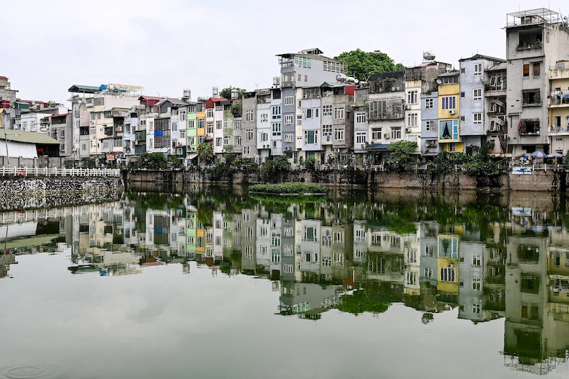 This photograph taken on June 8, 2021 shows narrow residential houses, known as u00e2u20acu02dcnha ongu00e2u20acu2122 in Vietnamese or u00e2u20acu02dctube housesu00e2u20acu2122, in an urban area of Hanoi. u00e2u20acu201d AFP pic