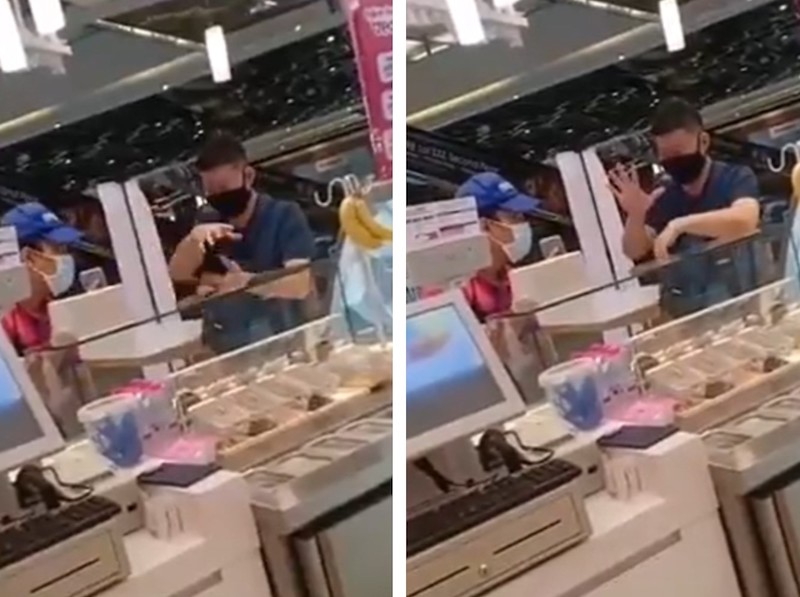 Muhammad Azizul (left) video called his friend to serve as a translator for the customer and himself (right). u00e2u20acu201d Screengrab via Twitter/@_azizuldean